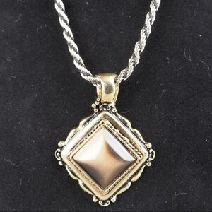 Unique brown gold pendant on thick rope chain